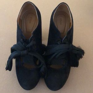 Chloe black suede ankle height heels.